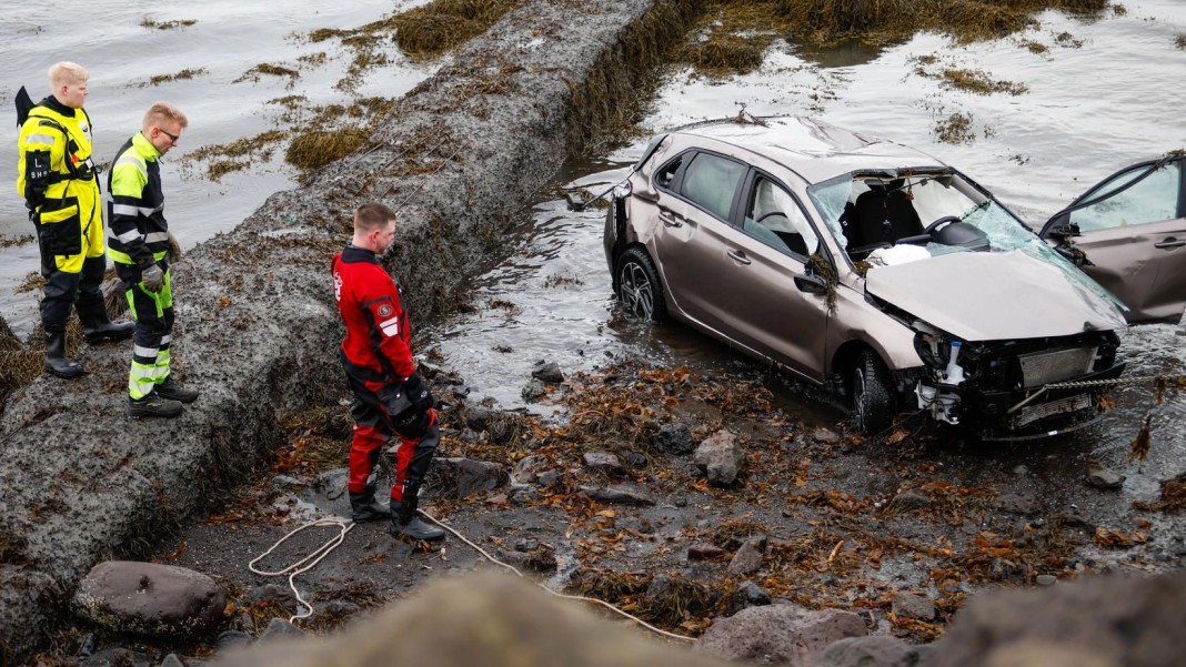 A car in the ocean.  The driver was found in Nauthólsvík